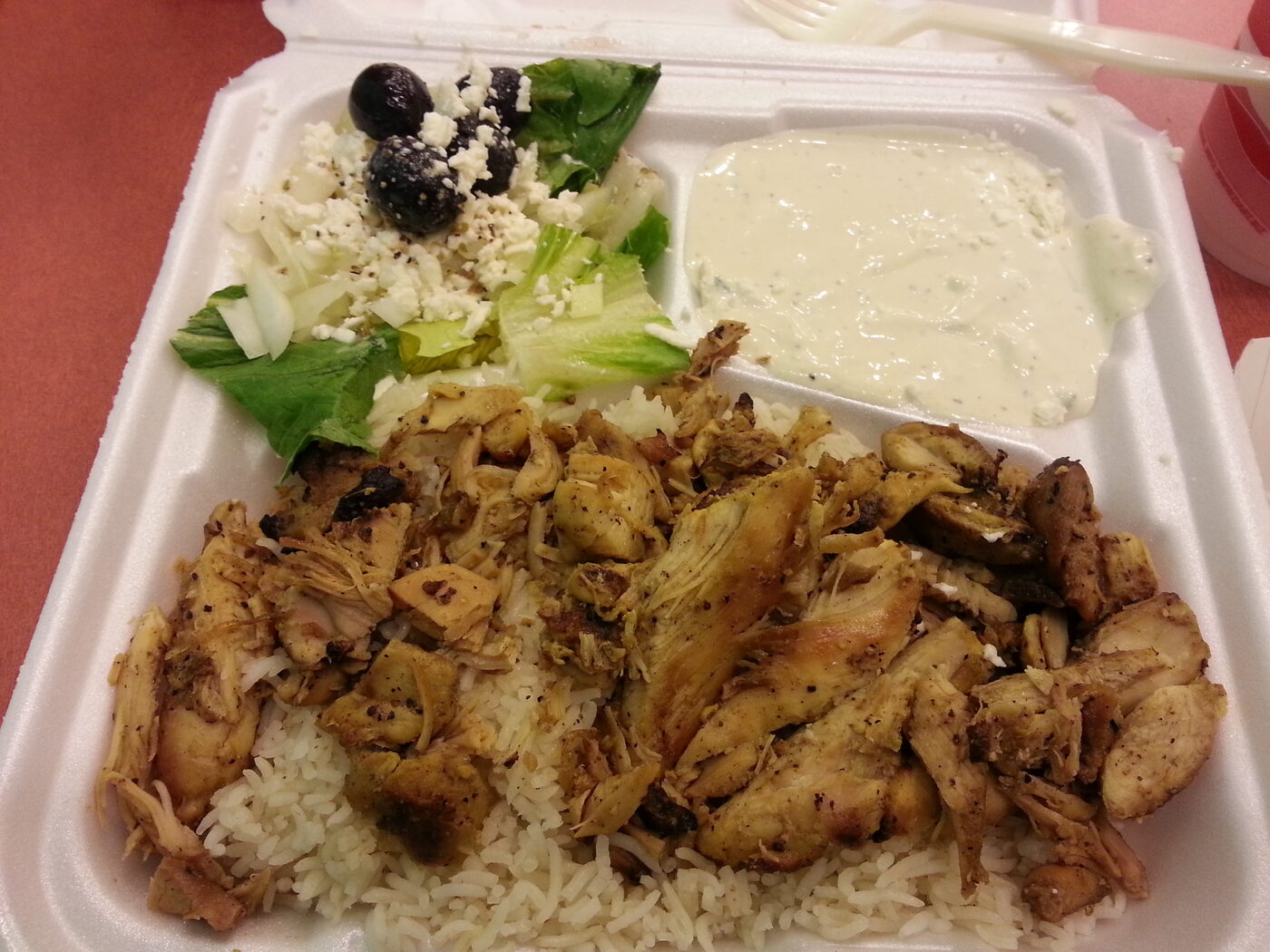 Shawarma plate with rice, salad and garlic